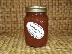 Photo of Just Plum Tasty Ketchup in a jar.
